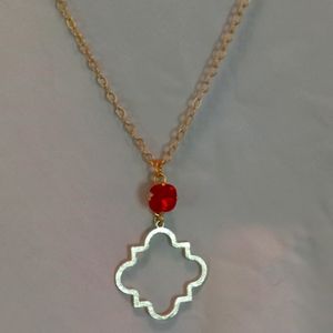 Swarovski crystal gold necklace with a ruby red crystal